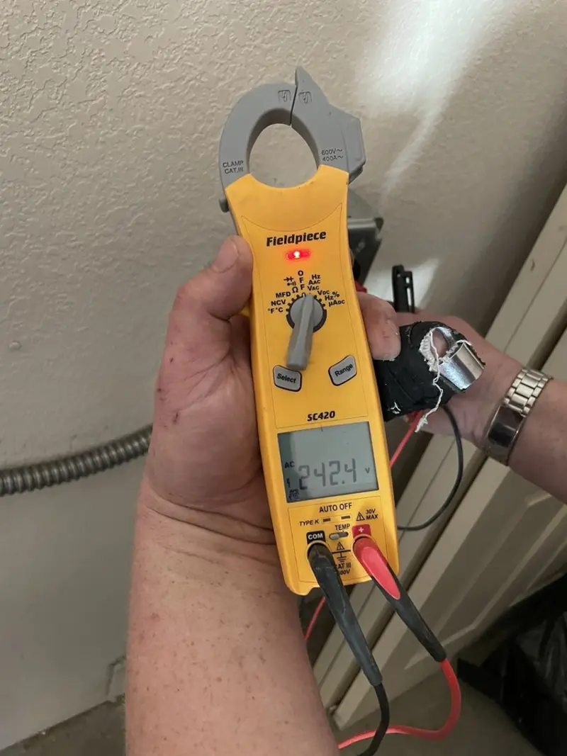 Voltage testing with clamp meter during Outlet Installation in Union